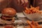 A deliciouse burger with sweet potaot fries. closezup, wallpaper, roasted, beef, salat;