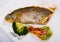 Deliciously steak of fried river trout fillet with broccoli and sause tartar