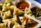 Delight in Vegetable Wontons with Sweet Chili Dip and Master the Art of Chopsticks