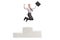 Delighted businessman jumping from a pedestal