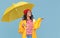 Delighted ethnic woman with umbrella catching raindrops