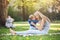 Delighted mother with her son outdoors in a park