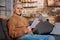 Delighted retired man holding documents