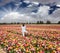 Delighted woman in white