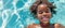 Delightful African American Girl Enjoying A Sunny Poolside Vacation