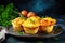A delightful breakfast option - egg and vegetable muffin with cheese and parsley