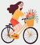 Delightful girl pedaling a bike with a basketful of blooms. Lovely woman cycling. Eco mobility concept. Perfect for web