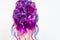 Delightfully bright colored hair, multi-colored coloring on long hair. An elegant high hairstyle