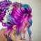 Delightfully bright colored hair, multi-colored coloring on long hair. An elegant high hairstyle