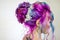 Delightfully bright colored hair, multi-colored coloring on long hair. An elegant high hairstyle