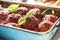 Delisious italian meal meat beef balls with basil in vintage roaster pan