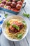 Delisious italian meal meat beef balls with pasta spaghetti and basil in white plate