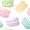 Delisious macaroons seamless pattern. Sweet almond french cakes macaron. Blue, rose, yellow, purple and green