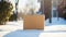 Delivered parcel box on door mat near winter snow entrance. Christmas online shopping. Black Friday sale.