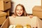 Delivering happiness. Little child open post package with toys. Deliver your treasures. Storage for toys. Relocating