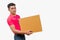 Delivery asian man. Happy young courier holding box