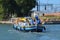 Delivery boat loaded with merchandise on a Venetian canal in Venice