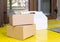 Delivery boxes on doorstep at home. Contactless food delivery. Safe shopping E-commerce purchase parcels at home. Boxes delivered