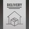 Delivery cardboard parcel box on floor near door