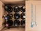 Delivery of case of wines from Naked Winery in cardboard box