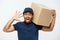 Delivery Concept - Portrait of Serious African American delivery man showing silly aggressive expression with holding a