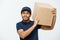 Delivery Concept - Portrait of Serious African American delivery man showing silly aggressive expression with holding a