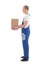 Delivery concept - side view of man in workwear with cardboard b