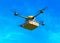 Delivery drone with pizza box on blue sky