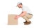 Delivery man crouching while picking cardboard box