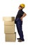 Delivery man lifting heavy weight boxes against having a backache