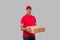 Delivery Man with Three Pizza Box in Hands Isolated. Red Tshirt Indian Delivery Boy