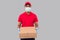 Delivery Man Three Pizza Box in Hands Wearing Medical Mask and Gloves Isolated. Red Tshirt Indian Delivery Boy