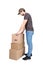 Delivery man wearing cap, full length portrait. Post worker prepared to carry and deliver the parcel boxes, isolated on white.