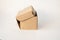 Delivery, moving and recycling concept. Opened cardboard box  on white background side view. mock up