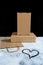 Delivery packing bag box craft pack flour meal heart table black background