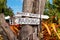 Delivery and Parking Signage On A Tree With Vintage Saddle And Bridle At Country Cafe