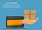 Delivery service concept. Hand comes out of a laptop and holds a box
