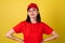 Delivery service worker woman in red cap, blank t-shirt, uniform