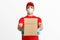 Delivery services. Courier in red uniform gives box