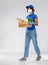 Delivery woman in face mask with food in box