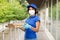 Delivery woman in face mask with pizza boxes