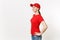Delivery woman in red uniform isolated on white background side view. Professional female in cap, t-shirt, jeans working