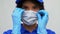 Delivery woman wearing protective mask and gloves