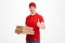 Deliveryman 25y in red t-shirt and cap holding stack of pizza bo