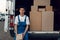 Deliveryman gives parcel to buyer, delivering