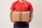 Deliveryman hands holding a cardboard parcel box giving fast delivery service, transportation and logistics concept. Generative AI