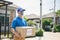Deliveryman holding boxes. Online shopping and free home delivery. Social distancing