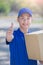 Deliveryman stand and thumb up