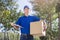 Deliveryman take cardboard