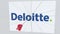 DELOITTE company logo being hit by archery arrow. Business crisis conceptual editorial animation